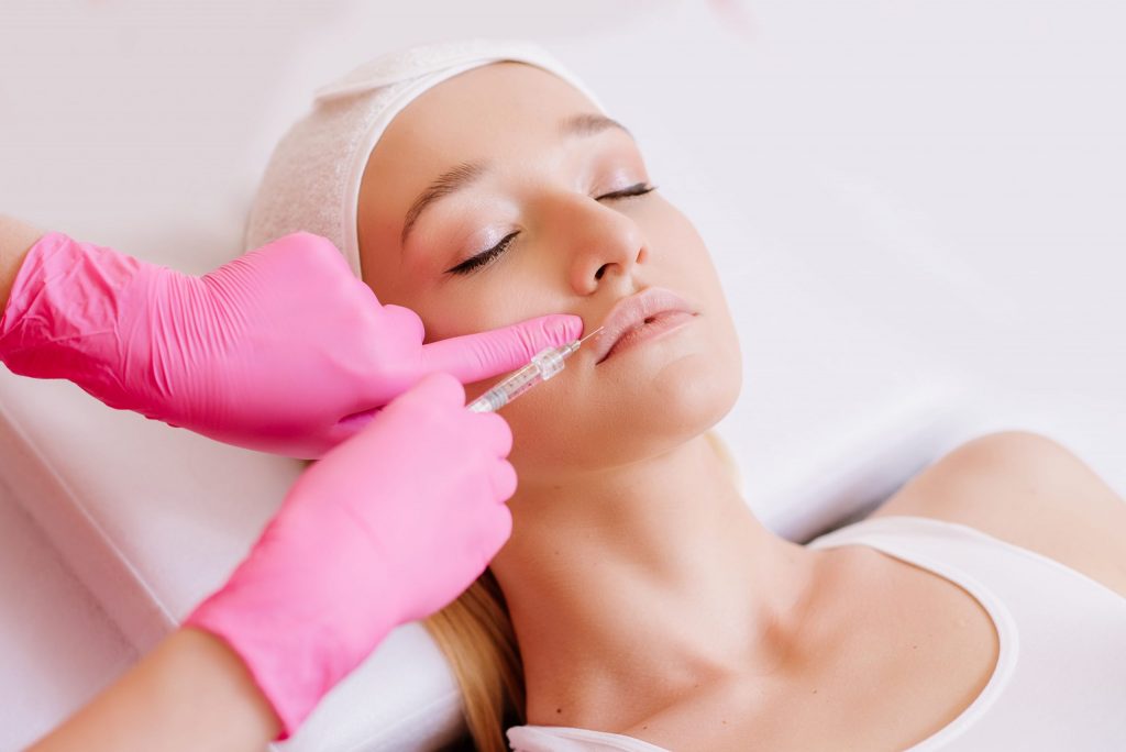 Woman Receiving Lip Filler Injection | Willow Boutique Med Spa in Avon, OH